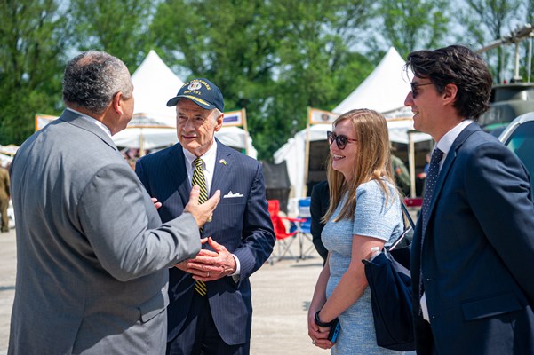 Secretary_of_the_Navy_Carlos_Del_Toro_converses_with_U.S._Senator_Tom_Carper_DE_and_others.